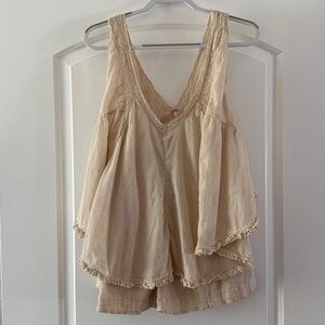 Free People Cream Textured V neck shorts romper.